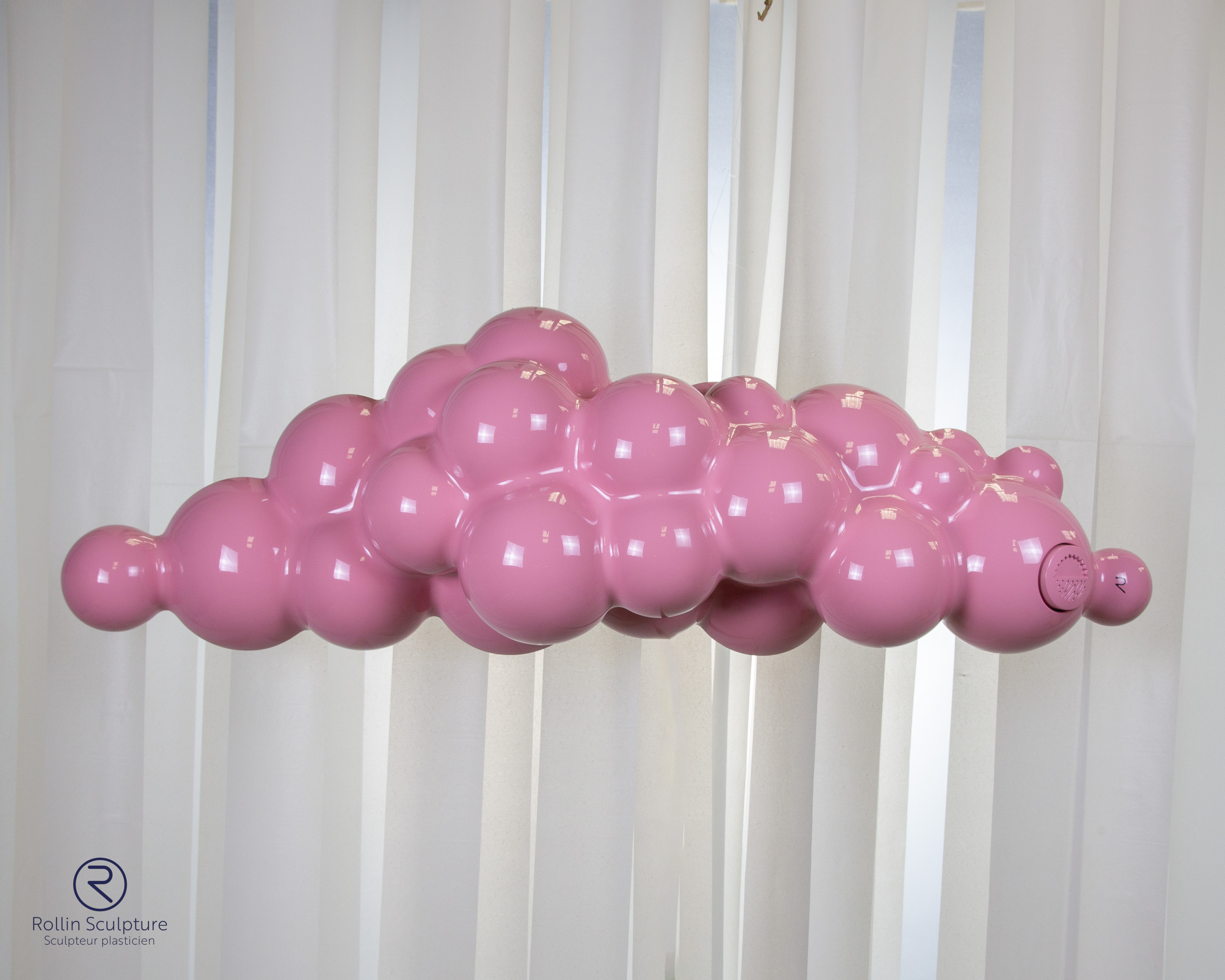 sculpture d'un nuage rose